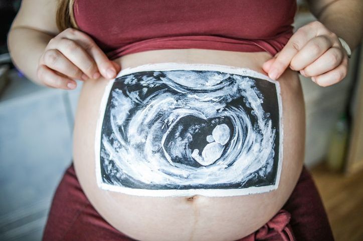 Belly painting baby shower ideas